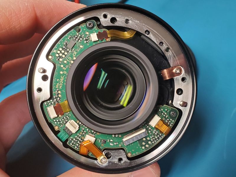 Chi tiết quy trình sửa chữa ống kính Sigma 45mm: Khi một cầu chài nhỏ bé gây ra sự cố lớn